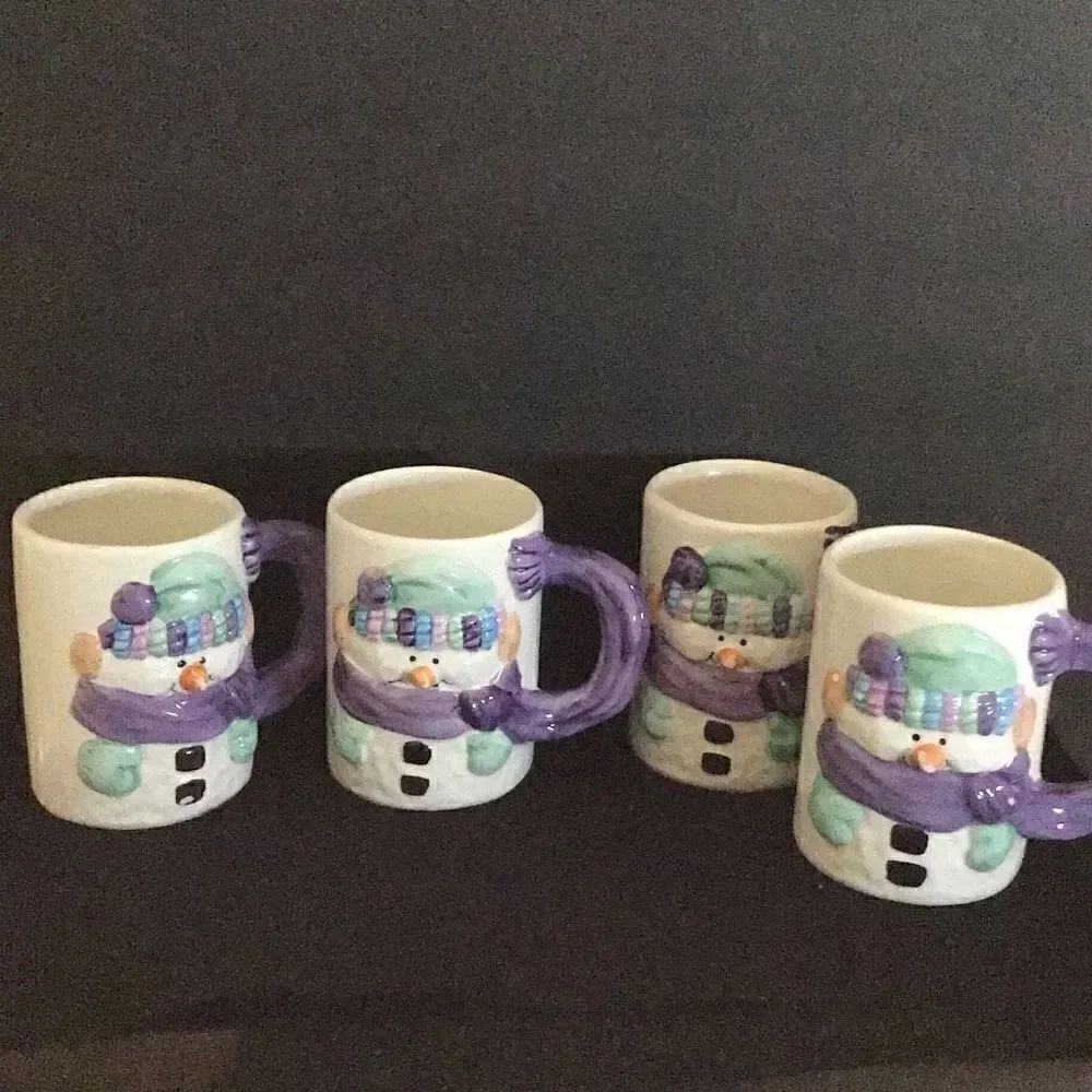 Mugs set of 4 vintage 3D snowman mugs by designPac, all have minor ware on protr